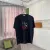 Black LOEWE T - Shirt With Colorful Logo Design For Fashion Enthusiasts #A54411