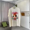 Gucci Purple T Shirt Featuring Blossom Cartoon Doll Graphic with Pink and Green Design Accents #A54263
