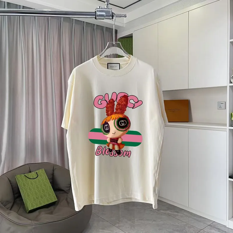 Gucci Purple T Shirt Featuring Blossom Cartoon Doll Graphic with Pink and Green Design Accents #A54263