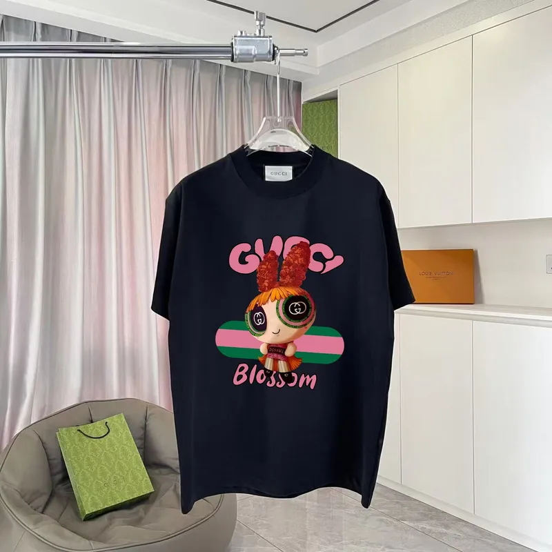 Gucci Purple T Shirt Featuring Blossom Cartoon Doll Graphic with Pink and Green Design Accents #A54263