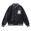 AMIRI Black Leather Bomber Jacket With Iconic Logo And Varsity Stripe Details #A54436 AMIRI Black Leather Bomber Jacket With Iconic Logo And Varsity Stripe Details #A54436