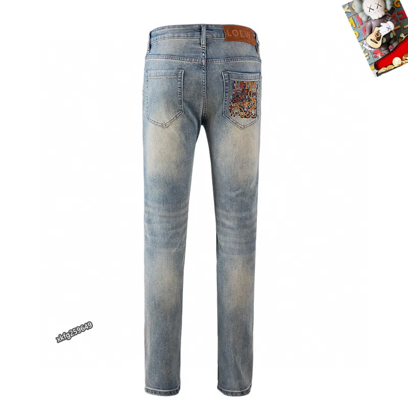 Loewe Distressed Patchwork Denim with Logo Detail #A45785