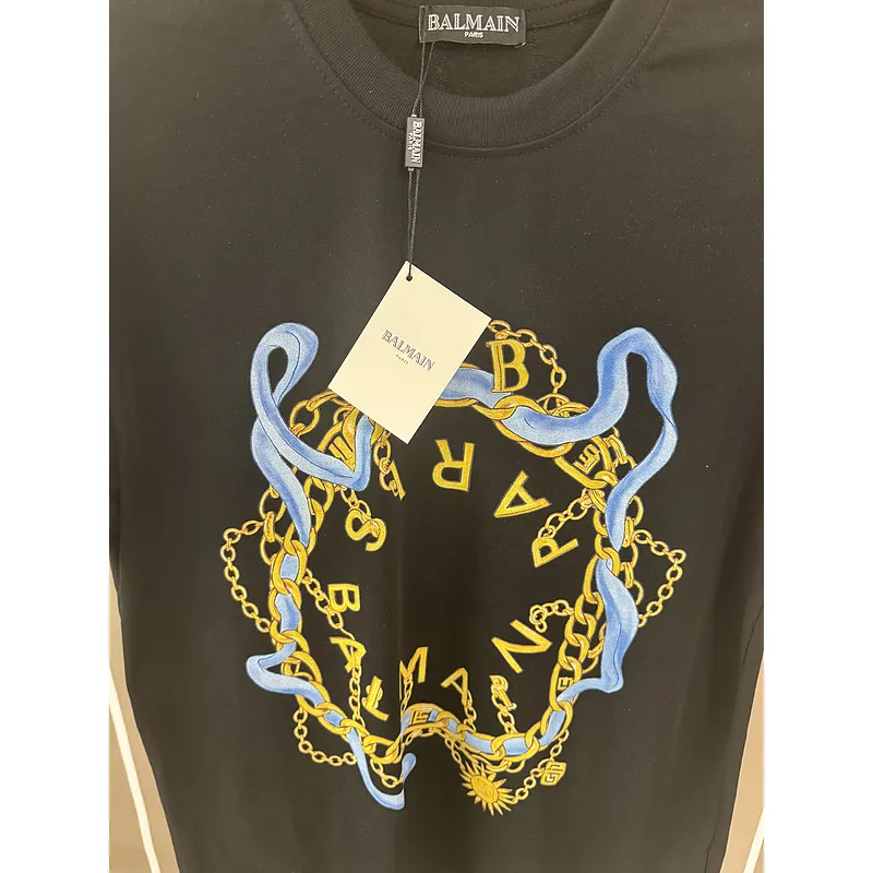 Balmain Paris White/Black T Shirt with Gold Chain and Blue Ribbon Circular Graphic Design for Men #A54257