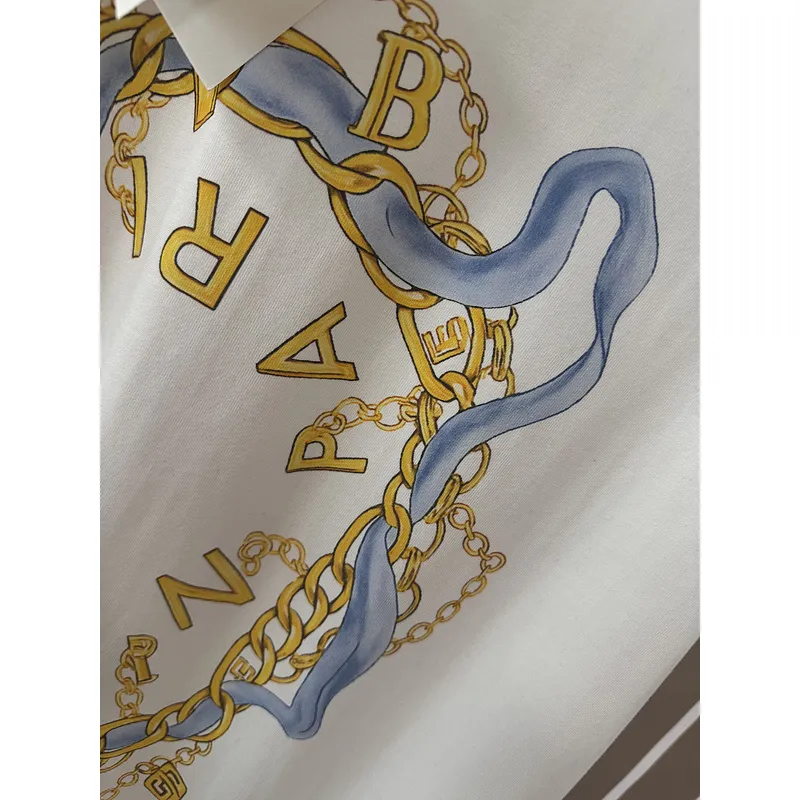 Balmain Paris White/Black T Shirt with Gold Chain and Blue Ribbon Circular Graphic Design for Men #A54257
