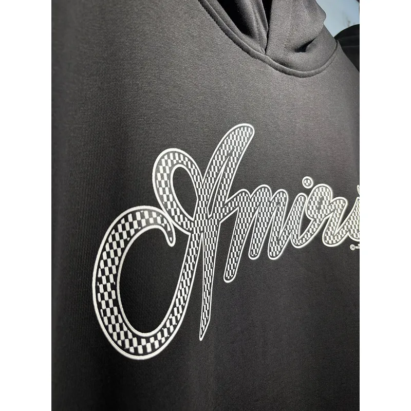 AMIRI Black Hoodie With Signature Script Logo For Timeless Streetwear Style #A54290