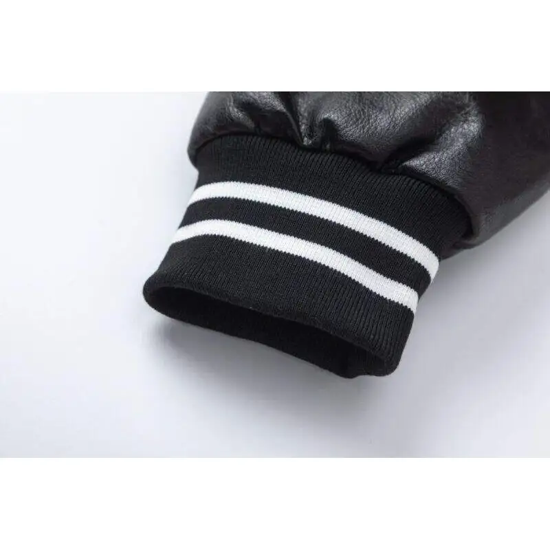 AMIRI Black Leather Bomber Jacket With Iconic Logo And Varsity Stripe Details #A54436 AMIRI Black Leather Bomber Jacket With Iconic Logo And Varsity Stripe Details #A54436