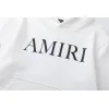 AMIRI Black/White Hoodie With Bold Logo And Orange Graphic Sleeves For Streetwear Style #A54282