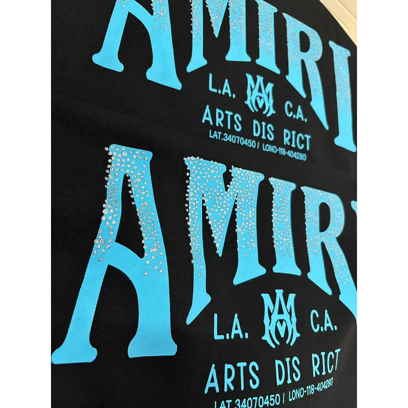 AMIRI Black Hoodie With Glittery Blue Back Logo And Brand Details #A54287 AMIRI Black Hoodie With Glittery Blue Back Logo And Brand Details #A54287