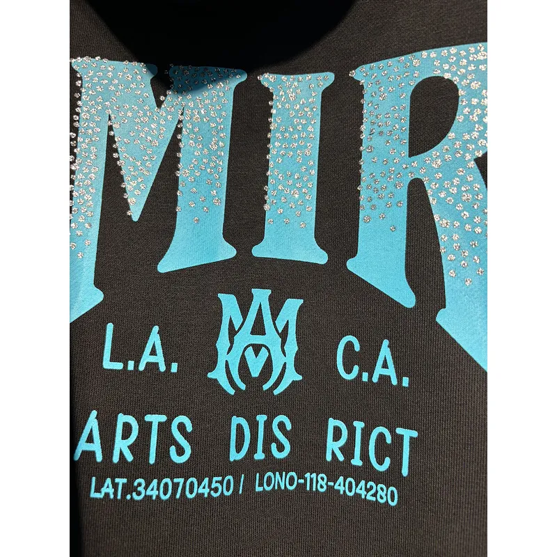 AMIRI Black Hoodie With Glittery Blue Back Logo And Brand Details #A54287 AMIRI Black Hoodie With Glittery Blue Back Logo And Brand Details #A54287