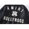 AMIRI Black Leather Bomber Jacket With Iconic Logo And Varsity Stripe Details #A54436 AMIRI Black Leather Bomber Jacket With Iconic Logo And Varsity Stripe Details #A54436