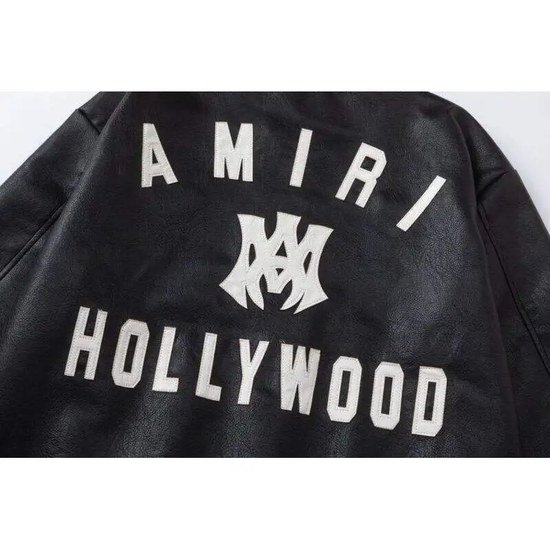 AMIRI Black Leather Bomber Jacket With Iconic Logo And Varsity Stripe Details #A54436 AMIRI Black Leather Bomber Jacket With Iconic Logo And Varsity Stripe Details #A54436