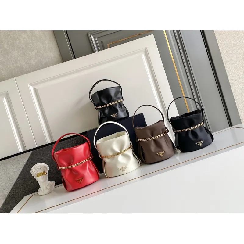 Prada Re-Edition Bucket Bag (4 Colors) – Red/Black/White/Brown Fabric with Gold-Tone Chain & Triangle Logo #A59177 Prada Re-Edition Bucket Bag (4 Colors) – Red/Black/White/Brown Fabric with Gold-Tone Chain & Triangle Logo #A59177