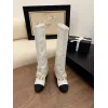 Chanel Knee - High Boots: Diverse Textures, Gold Chains, a Showcase of Luxe Creativity #A54193