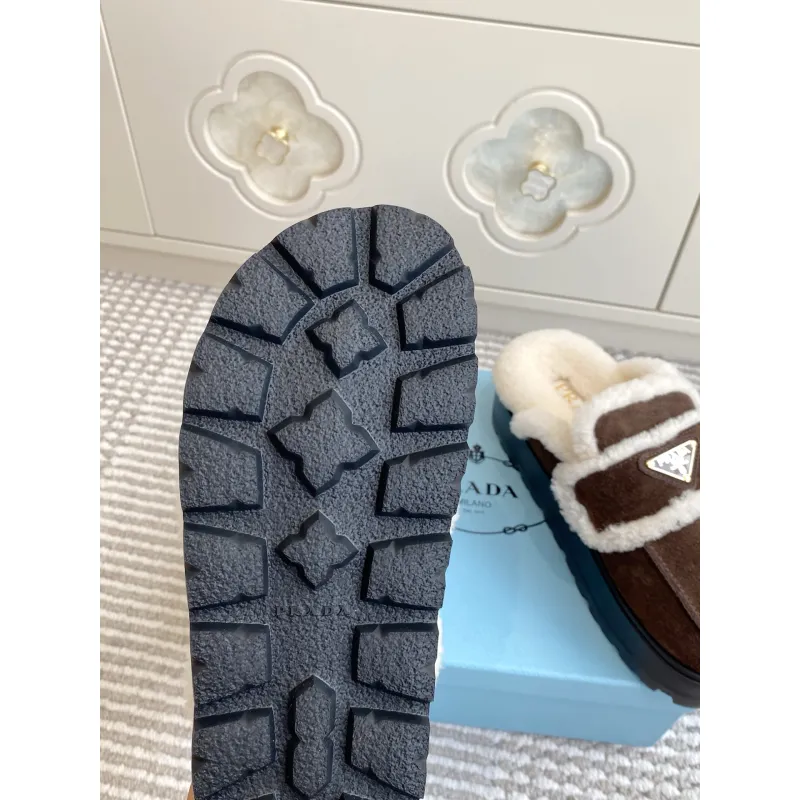 Prada Womens Shearling Lined Mule Slippers Triangle Logo Thick Sole Design for Cozy Luxury Winter Footwear #A57765