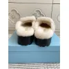 Prada Womens Shearling Lined Mule Slippers Triangle Logo Thick Sole Design for Cozy Luxury Winter Footwear #A57765