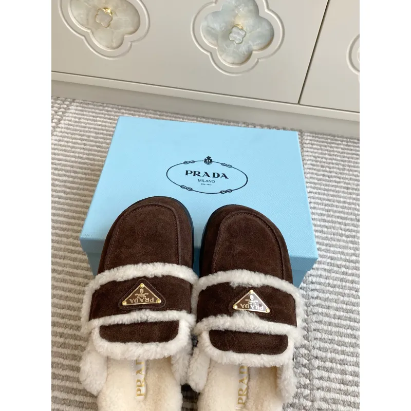 Prada Womens Shearling Lined Mule Slippers Triangle Logo Thick Sole Design for Cozy Luxury Winter Footwear #A57765