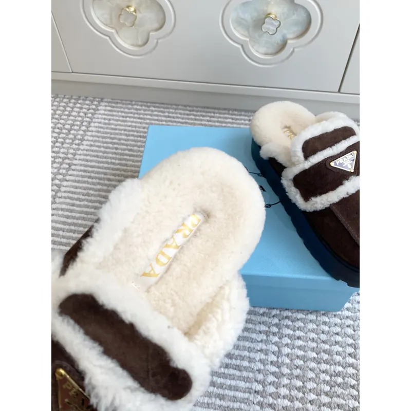 Prada Womens Shearling Lined Mule Slippers Triangle Logo Thick Sole Design for Cozy Luxury Winter Footwear #A57765