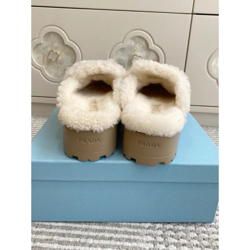 Prada Womens Shearling Lined Mule Slippers Triangle Logo Thick Sole Design for Cozy Luxury Winter Footwear #A57767