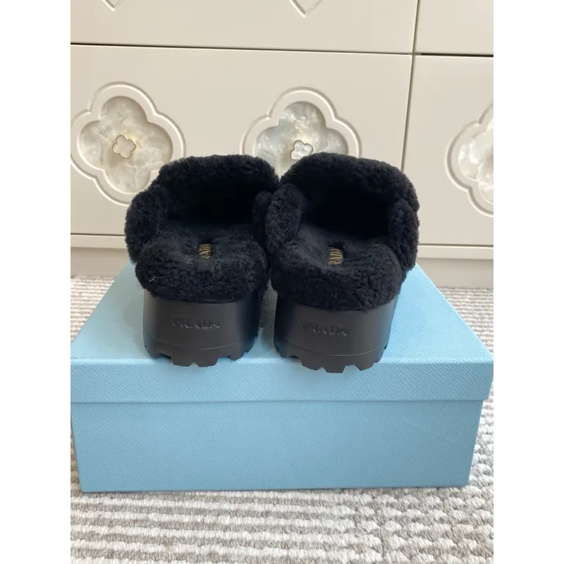 Prada Womens Shearling Lined Mule Slippers Triangle Logo Thick Sole Design for Cozy Luxury Winter Footwear #A57764