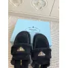 Prada Womens Shearling Lined Mule Slippers Triangle Logo Thick Sole Design for Cozy Luxury Winter Footwear #A57764