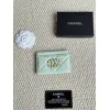 Chanel card holder with chain detail. #A45548