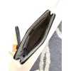 Hermès Leather Zip - Around Wristlet Clutches In Brown And Black With Branded Detailing #A50707
