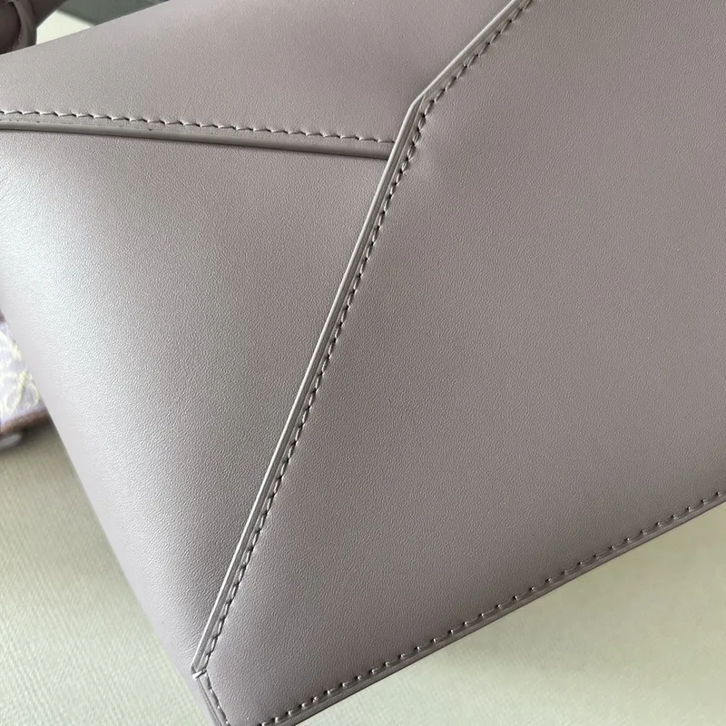 Loewe Puzzle Bag In Soft Lavender Leather With Branded Strap And Geometric Design #A50220
