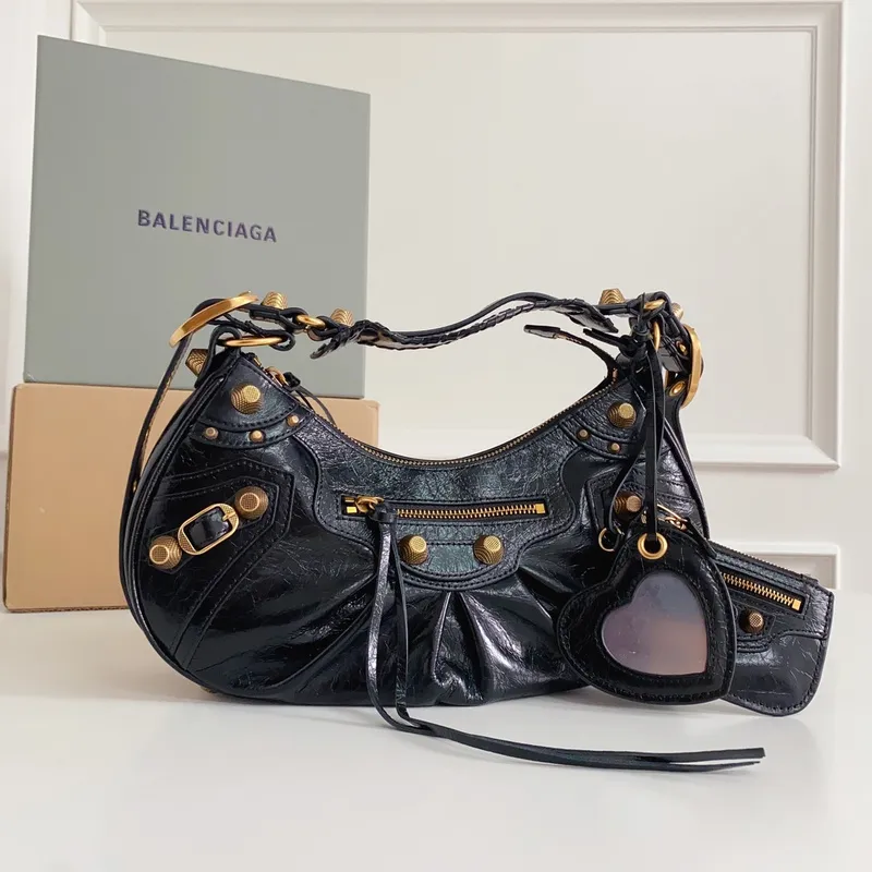 Balenciaga - Inspired Studded Shoulder Bags in Vibrant Color Palettes #A53897 Balenciaga - Inspired Studded Shoulder Bags in Vibrant Color Palettes #A53897
