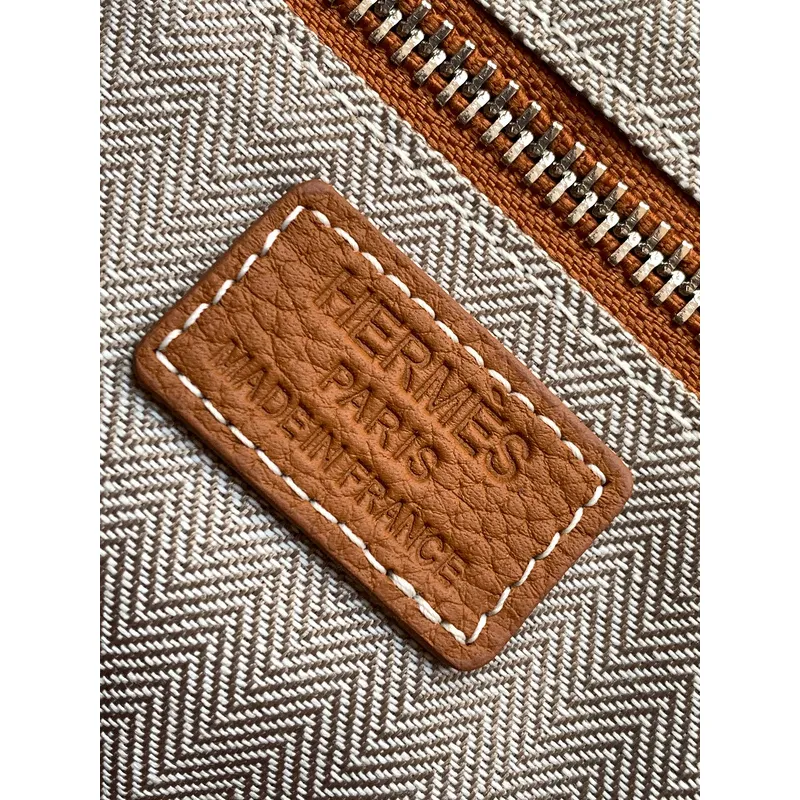 Hermès Leather Zip - Around Wristlet Clutches In Brown And Black With Branded Detailing #A50707