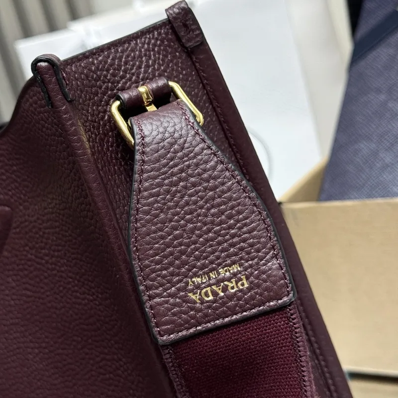 Prada 1BC073 Large Tote Bag - Burgundy Leather Crossbody Style with Adjustable Logo Strap #A59501 Prada 1BC073 Large Tote Bag - Burgundy Leather Crossbody Style with Adjustable Logo Strap #A59501