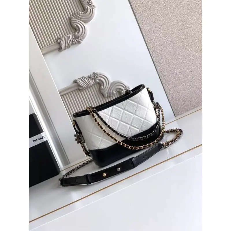 Chanel Womens Bucket Bag - Black & White Quilted Leather, Gold-Tone CC Logo & Two-Tone Chain Strap, Stylish Crossbody Bag for Luxury Fashion #A56750