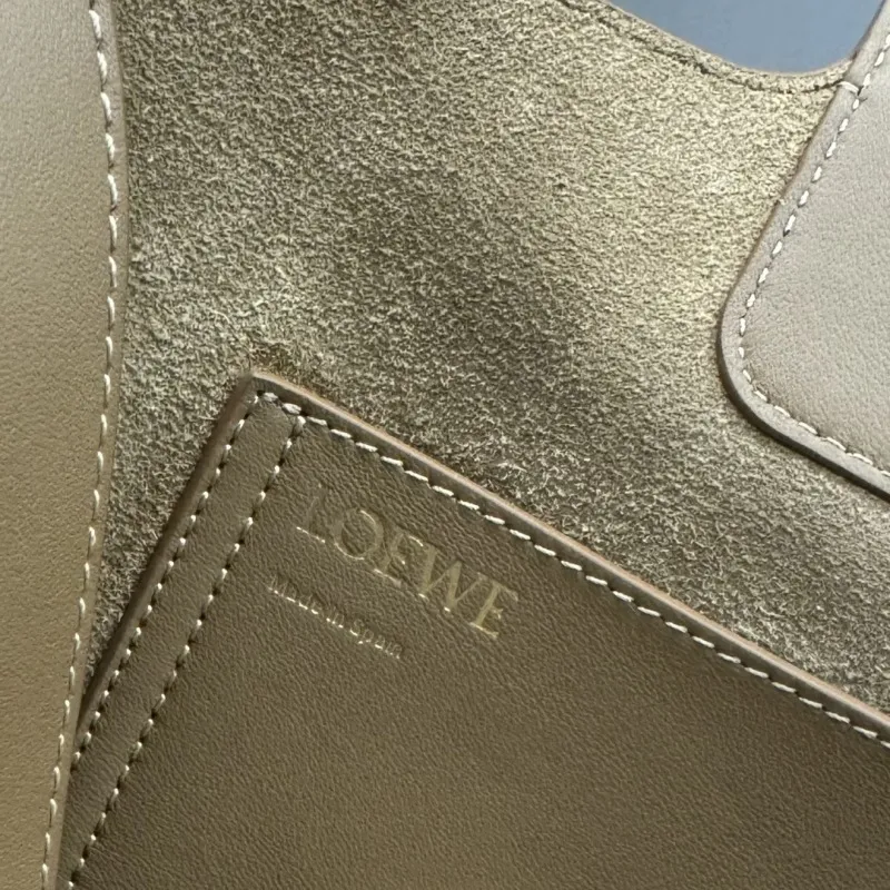 Loewe  Backpack - Multi-Tone Leather Patchwork, Anagram Logo, Drawstring Closure & Zipper Pocket, Stylish Luxury Backpack for Everyday Use #A56854