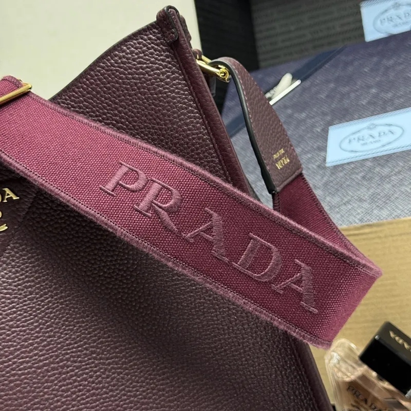Prada 1BC073 Large Tote Bag - Burgundy Leather Crossbody Style with Adjustable Logo Strap #A59501 Prada 1BC073 Large Tote Bag - Burgundy Leather Crossbody Style with Adjustable Logo Strap #A59501