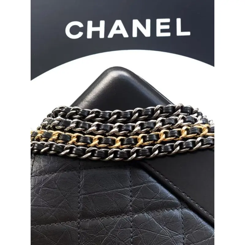 Chanel Womens Bucket Bag - Black & White Quilted Leather, Gold-Tone CC Logo & Two-Tone Chain Strap, Stylish Crossbody Bag for Luxury Fashion #A56750