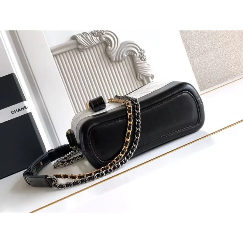 Chanel Womens Bucket Bag - Black & White Quilted Leather, Gold-Tone CC Logo & Two-Tone Chain Strap, Stylish Crossbody Bag for Luxury Fashion #A56750