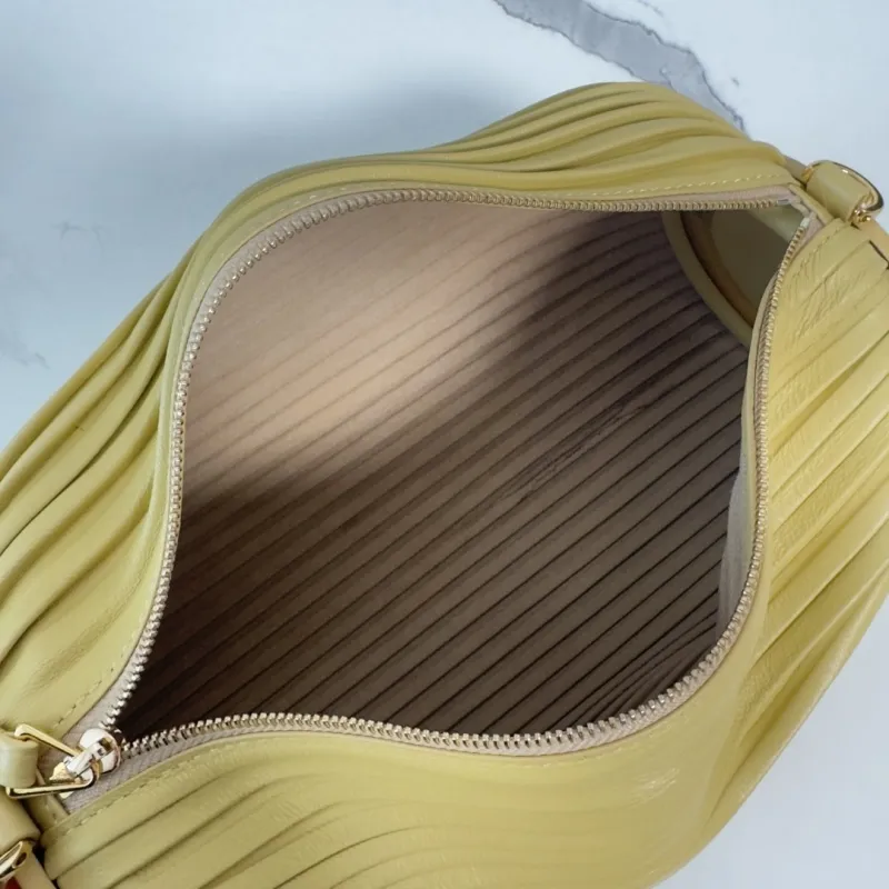 Loewe Womens Cylinder Shoulder Bag - Yellow Pleated Leather, Gold-Tone Hardware, Adjustable Strap, Stylish Barrel Bag with Anagram Logo #A56849