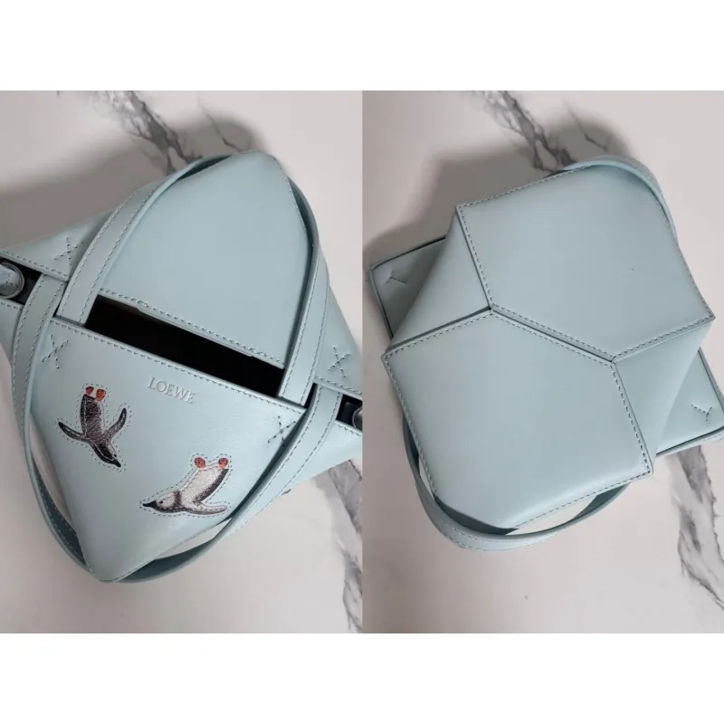 Loewe Womens Mini Bucket Bag - Light Blue Leather with Penguin Embroidery, Convertible Handle & Crossbody Strap, Playful Luxury Handbag with Anagram Logo #A56856
