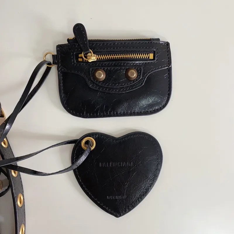 Balenciaga - Inspired Studded Shoulder Bags in Vibrant Color Palettes #A53897 Balenciaga - Inspired Studded Shoulder Bags in Vibrant Color Palettes #A53897
