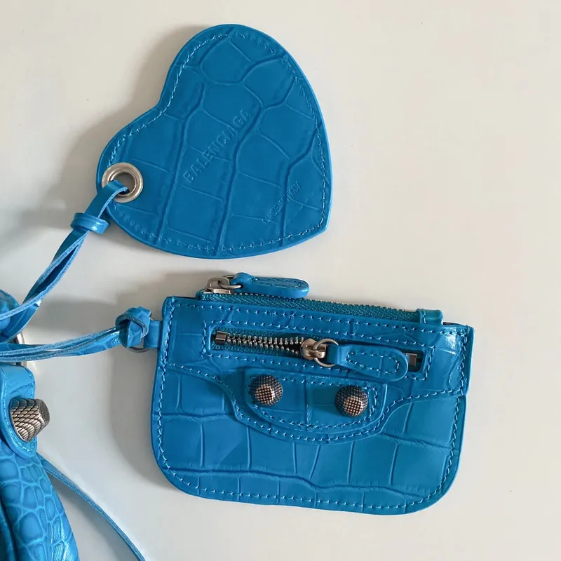 Balenciaga - Inspired Studded Shoulder Bags in Vibrant Color Palettes #A53897 Balenciaga - Inspired Studded Shoulder Bags in Vibrant Color Palettes #A53897