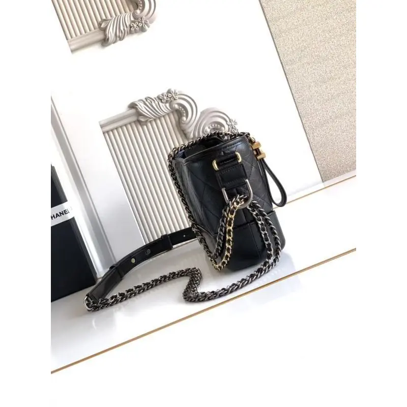 Chanel Womens Bucket Bag - Black & White Quilted Leather, Gold-Tone CC Logo & Two-Tone Chain Strap, Stylish Crossbody Bag for Luxury Fashion #A56750