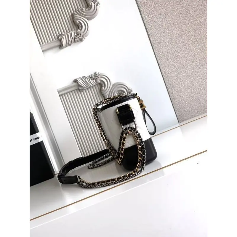 Chanel Womens Bucket Bag - Black & White Quilted Leather, Gold-Tone CC Logo & Two-Tone Chain Strap, Stylish Crossbody Bag for Luxury Fashion #A56750