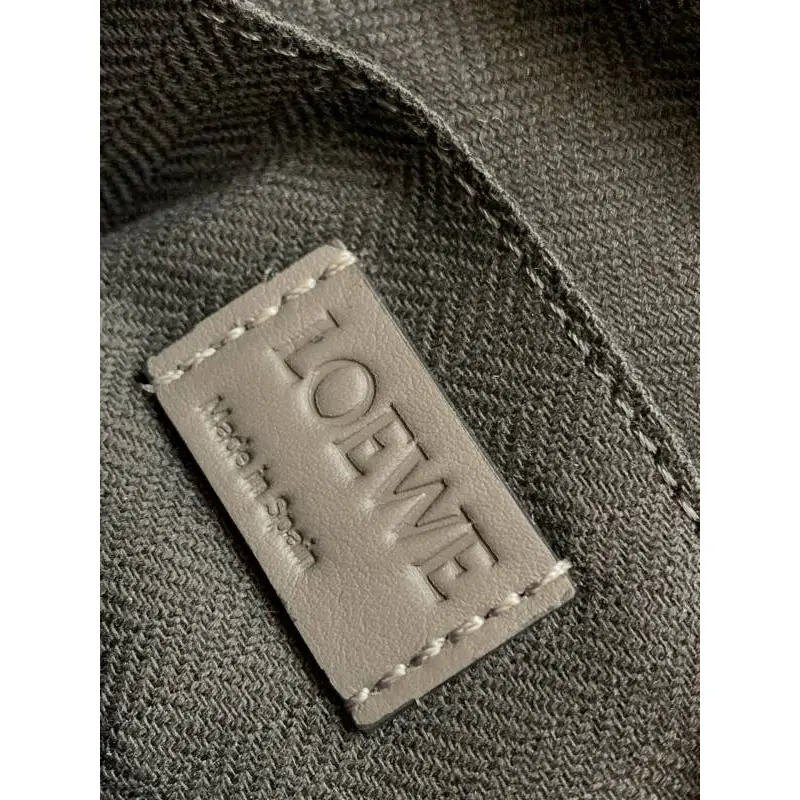 Loewe  Backpack - Multi-Tone Leather Patchwork, Anagram Logo, Drawstring Closure & Zipper Pocket, Stylish Luxury Backpack for Everyday Use #A56851