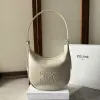 Celine Ava Hobo Bag - Beige Leather, Embossed Triomphe Logo, Elegant Shoulder Bag for Women, Luxury Fashion Accessory #A56756