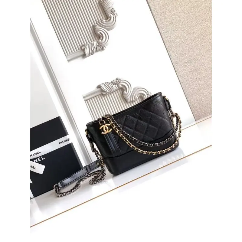 Chanel Womens Bucket Bag - Black & White Quilted Leather, Gold-Tone CC Logo & Two-Tone Chain Strap, Stylish Crossbody Bag for Luxury Fashion #A56750
