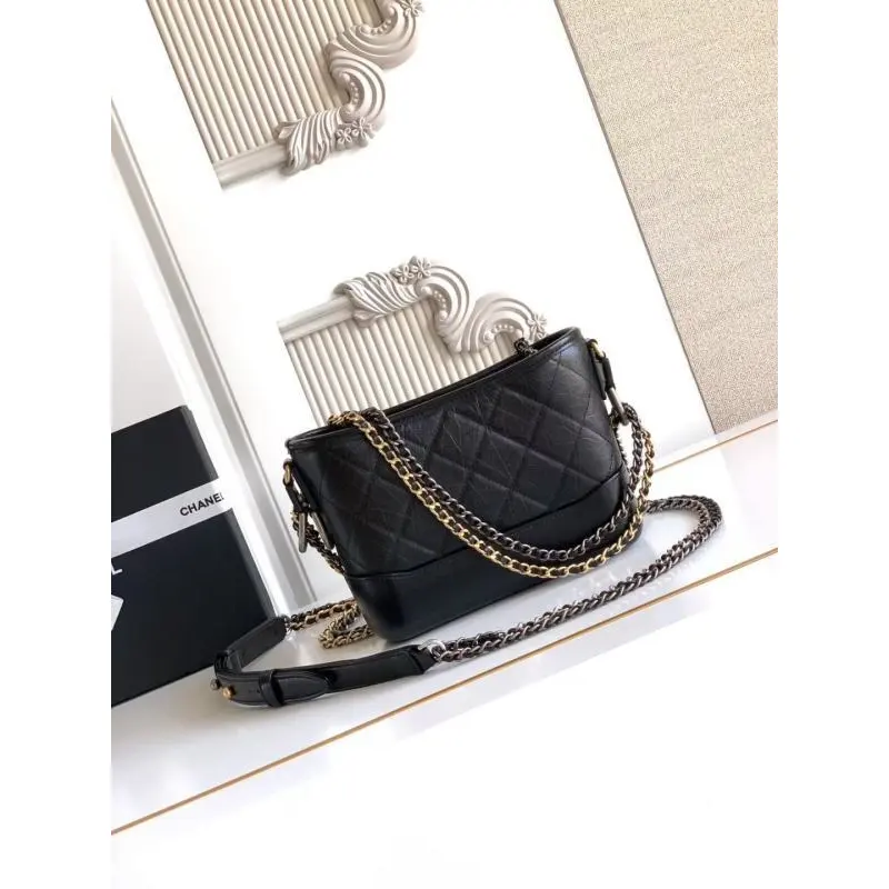 Chanel Womens Bucket Bag - Black & White Quilted Leather, Gold-Tone CC Logo & Two-Tone Chain Strap, Stylish Crossbody Bag for Luxury Fashion #A56750