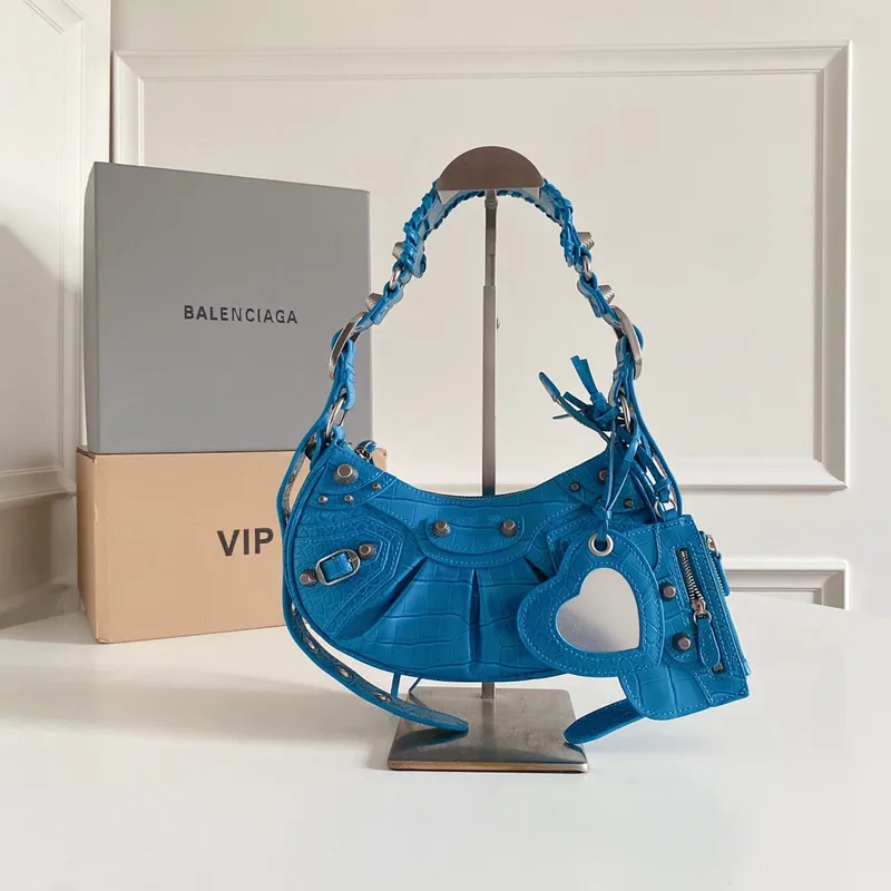 Balenciaga - Inspired Studded Shoulder Bags in Vibrant Color Palettes #A53897 Balenciaga - Inspired Studded Shoulder Bags in Vibrant Color Palettes #A53897