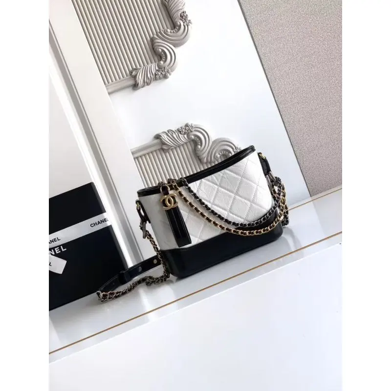 Chanel Womens Bucket Bag - Black & White Quilted Leather, Gold-Tone CC Logo & Two-Tone Chain Strap, Stylish Crossbody Bag for Luxury Fashion #A56750