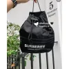 Burberry Bucket Bags Showcasing Iconic Patterns and Stylish Designs #A50418