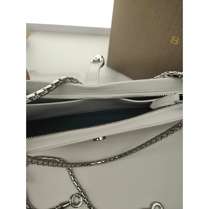 Bvlgari Serpenti Handbag Collection In Vibrant Colors And Chain Detailing #A51659