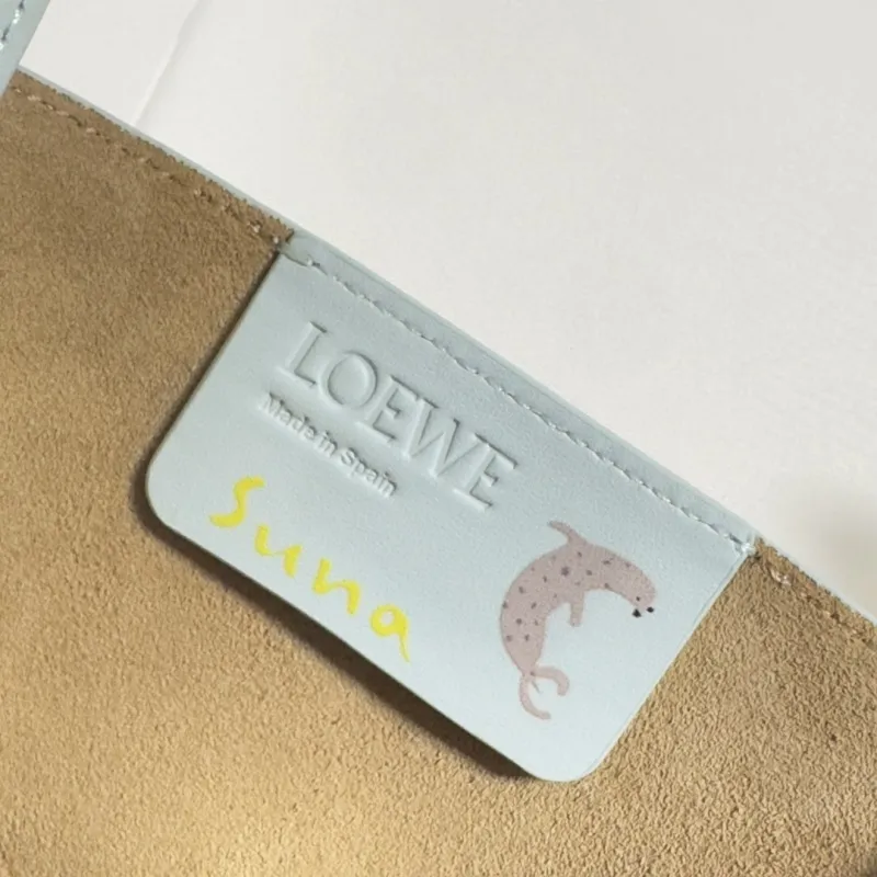 Loewe Womens Mini Bucket Bag - Light Blue Leather with Penguin Embroidery, Convertible Handle & Crossbody Strap, Playful Luxury Handbag with Anagram Logo #A56856